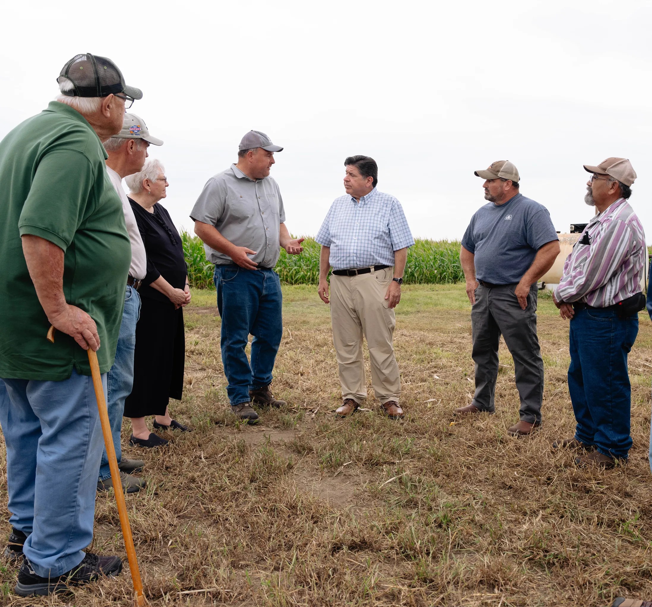 photo of Governor JB Pritzker speaking with farmers