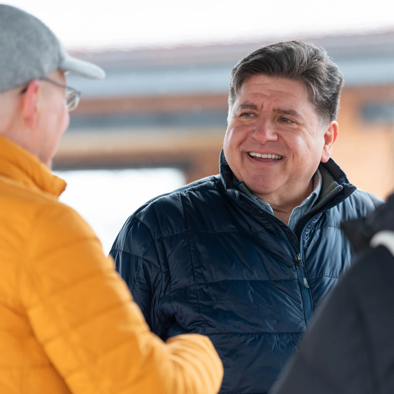 photo of JB Pritzker meeting with constituents