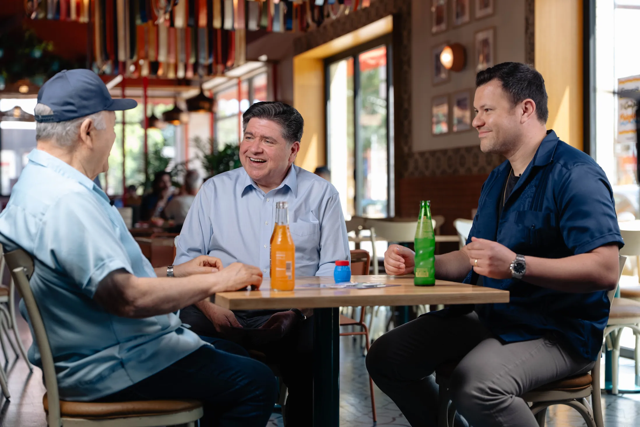 photo of Governor JB Pritzker speaking with constituents